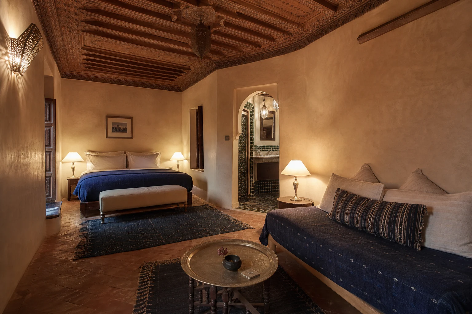 Spacious Dar Damana suite with indigo textiles and a carved cedar ceiling